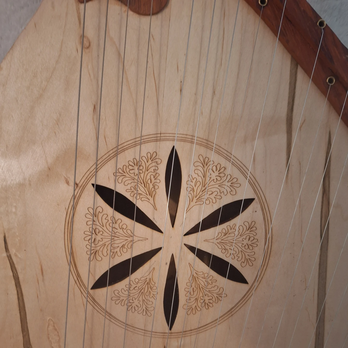 Custom jazz bandura soundboard with etched rosette and strings